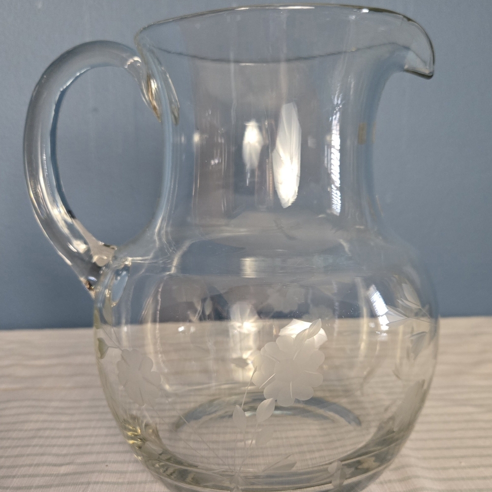 Elegant Clear Glass Pitcher with Floral Design